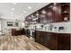 Gourmet kitchen features stainless steel appliances, and ample cabinet space at 14524 Huntingfield Dr, Orlando, FL 32824