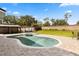 Inviting backyard pool and spa with brick paved patio and gazebo at 14524 Huntingfield Dr, Orlando, FL 32824