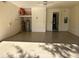 Spacious garage with ample storage space and a clean concrete floor at 152 Glendale Ct, Kissimmee, FL 34759
