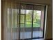 Covered lanai with view of fenced backyard at 152 Glendale Ct, Kissimmee, FL 34759