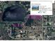 Aerial view of the property lines and neighboring area including a lake and roads at 17927 E Apshawa Rd, Minneola, FL 34715
