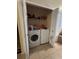Laundry closet with side-by-side washer and dryer at 1909 Lakeview Pl, Kissimmee, FL 34759