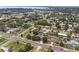 Real estate listing showing an aerial view of neighborhood homes at 203 E Lakeview Ave, Eustis, FL 32726