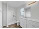 Modern bathroom with walk-in shower, vanity, and updated finishes at 203 E Lakeview Ave, Eustis, FL 32726
