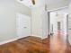 Bedroom featuring hardwood floors and a doorway to another room at 2209 Callaway Ct, Davenport, FL 33837