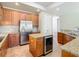 Spacious kitchen featuring granite countertops, stainless steel appliances, and ample cabinet space at 2209 Callaway Ct, Davenport, FL 33837