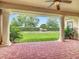 Outdoor patio with brick flooring, columns, and view of the backyard at 2209 Callaway Ct, Davenport, FL 33837