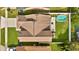 Aerial view of a home with a pool, patio, and well-maintained landscaping at 2235 Meadowmouse St, Orlando, FL 32837
