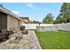Backyard with a paved patio, cozy seating, and an above-ground pool for summer fun at 2235 Meadowmouse St, Orlando, FL 32837