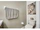 Bathroom features stylish decor, toilet, and fresh towels ready for use at 2235 Meadowmouse St, Orlando, FL 32837
