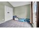Comfortable bedroom has a vaulted ceiling, closet, and large window for natural light at 2235 Meadowmouse St, Orlando, FL 32837