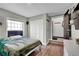 Bedroom featuring natural light, a large closet, and access to the hallway at 2235 Meadowmouse St, Orlando, FL 32837