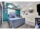 Upstairs bedroom features custom fan art and storage, vaulted ceilings, and an abundance of natural light at 2235 Meadowmouse St, Orlando, FL 32837
