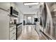 Updated kitchen with stainless steel appliances and bright tile flooring at 2235 Meadowmouse St, Orlando, FL 32837