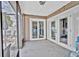 Enclosed back patio with access to the outdoor space, extending the living area at 2235 Meadowmouse St, Orlando, FL 32837