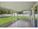 Screened-in patio with tile flooring, offering a bug-free zone for outdoor enjoyment and relaxation at 253 Churchill Ct, Kissimmee, FL 34758