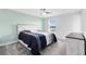 Comfortable bedroom with great natural light and a soothing color palette at 3099 Ella Way, St Cloud, FL 34771