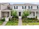 Charming townhome with beautifully landscaped front yard at 3099 Ella Way, St Cloud, FL 34771