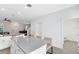 Bright, open kitchen with island, stainless steel appliances, and ample counter space at 3099 Ella Way, St Cloud, FL 34771