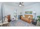 Cozy sitting room with natural light and neutral finishes at 3160 Whisper Wind Dr, St Cloud, FL 34771
