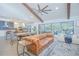 Open-concept living space with an airy feel, seamlessly connecting the kitchen, dining, and living areas at 3160 Whisper Wind Dr, St Cloud, FL 34771