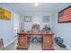Home office featuring classic wood desk, decor, and natural light at 3160 Whisper Wind Dr, St Cloud, FL 34771