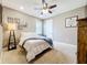 Bright bedroom showcasing soft carpet, light walls, and natural light with a cozy sleeping space at 31980 Geoff Way, Sorrento, FL 32776