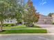 Single-story home with well manicured lawn and landscaping plus brick paved driveway at 31980 Geoff Way, Sorrento, FL 32776