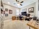 Well-lit office space with desk, computer, printer, and memorabilia displays at 31980 Geoff Way, Sorrento, FL 32776