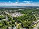 An aerial view of the lot featuring mature trees and convenient access to surrounding amenities at 370 Hand Ave, Ormond Beach, FL 32174