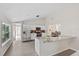 Bright kitchen features stainless steel appliances, granite countertops, and ample cabinet space at 370 Hand Ave, Ormond Beach, FL 32174