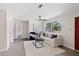Inviting living room featuring modern floors, bright windows, and comfortable seating at 370 Hand Ave, Ormond Beach, FL 32174