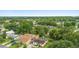 Aerial view of a property showcasing mature trees and surrounding neighborhood at 3702 Starks St, Orlando, FL 32805