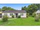 Charming single-story home features a well-maintained lawn and cozy facade at 3702 Starks St, Orlando, FL 32805