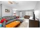 Large living room offering a sofa, natural light, and an entertainment area at 3702 Starks St, Orlando, FL 32805