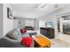 Spacious living room with a TV, comfortable sofa, and an open layout at 3702 Starks St, Orlando, FL 32805