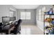 Versatile home office space with natural light and tile flooring, ideal for a productive workspace at 3702 Starks St, Orlando, FL 32805