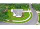 Aerial view of a home with a grey roof, sidewalk lined street, and manicured lawn at 400 Timbercreek N Dr, Winter Garden, FL 34787