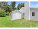 Storage shed on a well-maintained lawn at 400 Timbercreek N Dr, Winter Garden, FL 34787