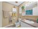 Well-appointed bathroom with vanity, toilet and custom wall art at 414 W 19Th St, Sanford, FL 32771