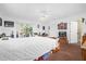 Spacious main bedroom with carpet and sliding glass doors to the backyard at 414 W 19Th St, Sanford, FL 32771