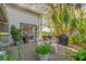 Enjoy outdoor living on the patio, perfect for grilling and entertaining guests surrounded by lush landscaping at 414 W 19Th St, Sanford, FL 32771