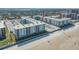 Beautiful aerial view of beachfront property with pool and beach access at 4151 S Atlantic Ave # 5110, New Smyrna Beach, FL 32169