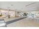 Spacious indoor common area with seating, tables, and ample natural light, creating a welcoming atmosphere at 4151 S Atlantic Ave # 5110, New Smyrna Beach, FL 32169