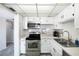 Well-lit kitchen with stainless steel appliances and ample counter space at 4151 S Atlantic Ave # 5110, New Smyrna Beach, FL 32169