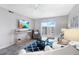 Cozy living room with ocean view balcony access and neutral décor at 4151 S Atlantic Ave # 5110, New Smyrna Beach, FL 32169