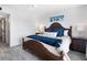 Spacious bedroom featuring a coastal decor theme, neutral walls and updated flooring at 4151 S Atlantic Ave # 5110, New Smyrna Beach, FL 32169