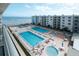 Inviting community pools and lounging area with ocean view at 4151 S Atlantic Ave # 5110, New Smyrna Beach, FL 32169