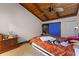 Bedroom featuring vaulted wood ceiling and ample space at 5310 Pebble Beach Dr # F, Orlando, FL 32811