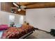 Cozy bedroom with vaulted wood ceiling and unique fan at 5310 Pebble Beach Dr # F, Orlando, FL 32811